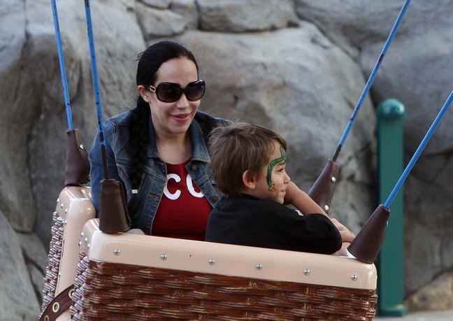 Nadya Suleman, denim jacket, red tshirt, sunglasses